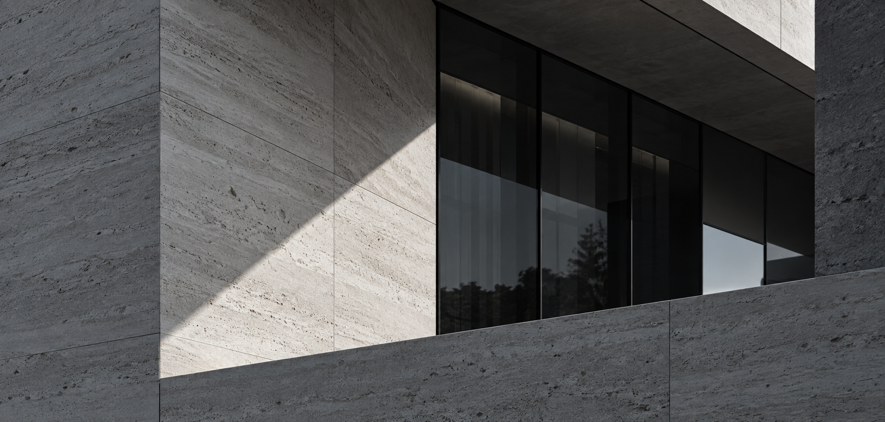 Illustrative architectural study of stone, glass and diagonal sunlight